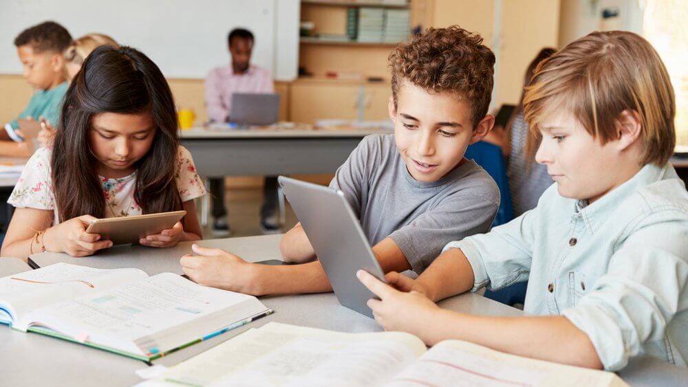 Kids working on tablets