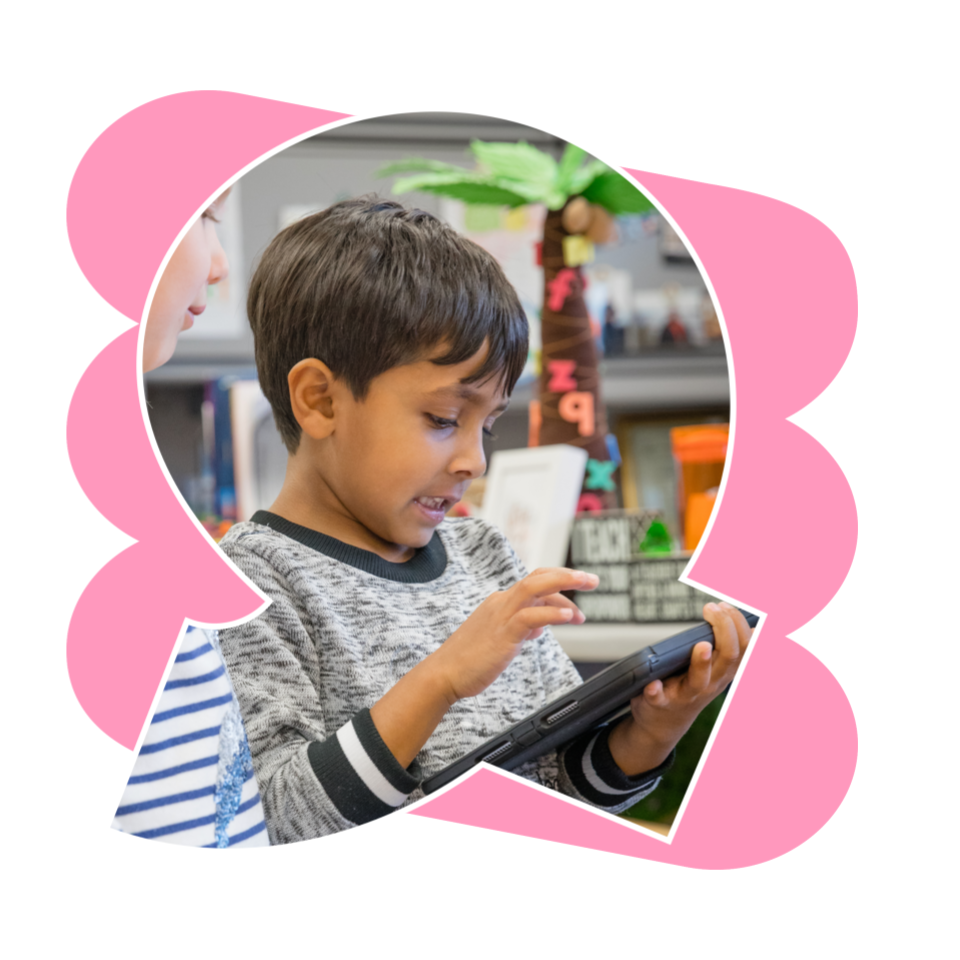 Kindergarten student on an iPad